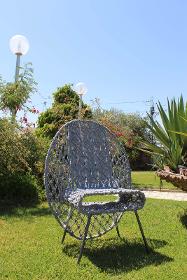 Single Curvaceous Gray Chair